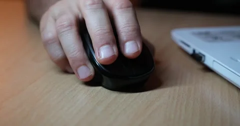 Hand Using Mouse While Working on Laptop, Close-Up of Computer Workspace Stock Footage 328103656