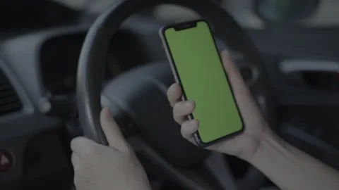 Hand using phone in car Stock Footage 262710323