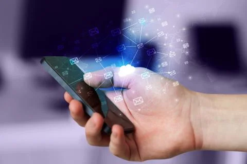 Hand using phone with centralized cloud computing system concept Stock Photos