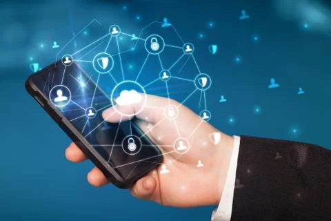 Hand using phone with centralized linked cloud system concept Stock Photos