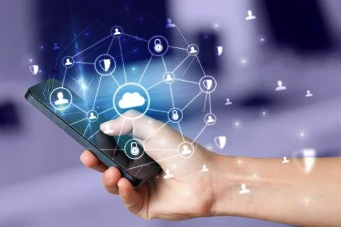 Hand using phone with centralized linked cloud system concept Stock Photos