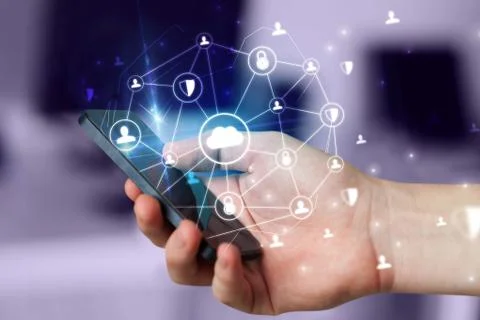 Hand using phone with centralized linked cloud system concept Stock Photos