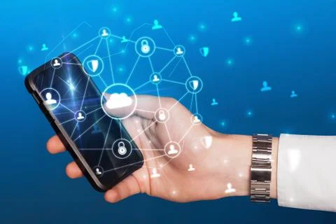 Hand using phone with centralized linked cloud system concept Stock Photos