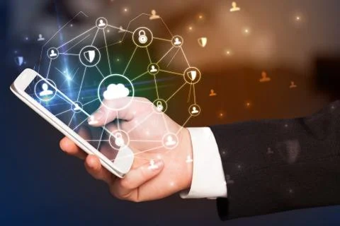 Hand using phone with centralized linked cloud system concept Stock Photos