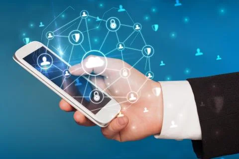 Hand using phone with centralized linked cloud system concept Stock Photos