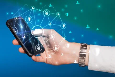 Hand using phone with centralized linked cloud system concept Stock Photos