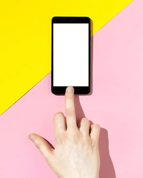 Hand using phone screen and shows gesture of Fuck you. Bad communication concept Stock Photos