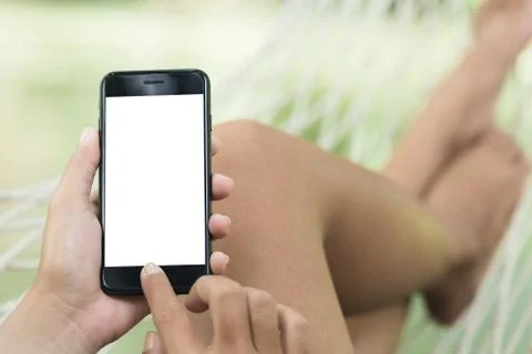 Hand using phone showing blank screen Stock Photos