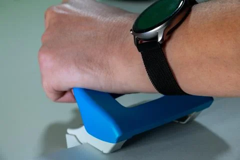 Hand Using Safety Cutter on Flat Surface - Packaging Tool in Action Stock Photos