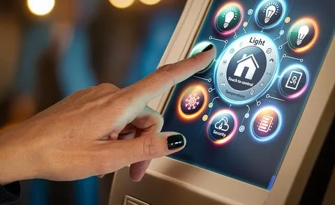 Hand Using Smart Home Control Panel Touchscreen Stock Photos
