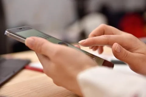 Hand using Smart phone Stock Photos