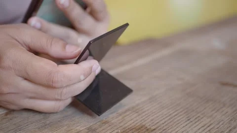 Hand using smart phone to scan the QR code to find the cafe menu Stock Footage 318434376
