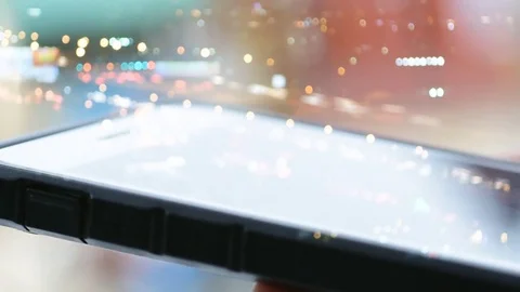 Hand using smart phone on time lapse blurry light city at night double exposure Video stock 82327793