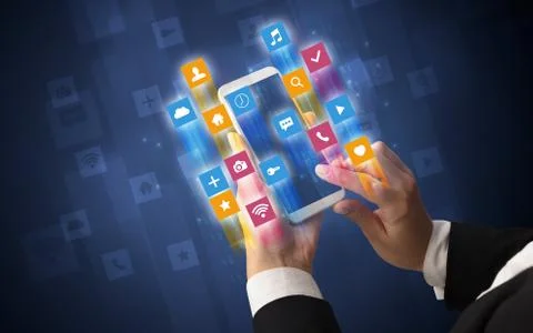 Hand using smartphone with angular app icons Stock Photos