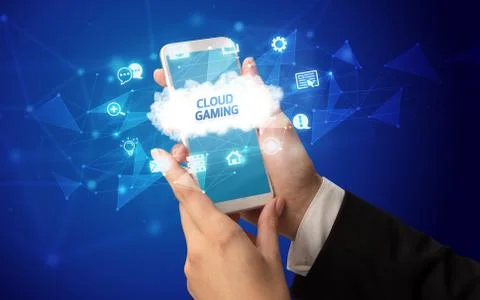 Hand using smartphone with cloud technology concept Foto stock