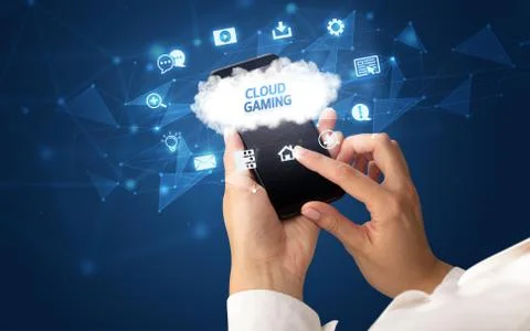 Hand using smartphone with cloud technology concept Foto stock