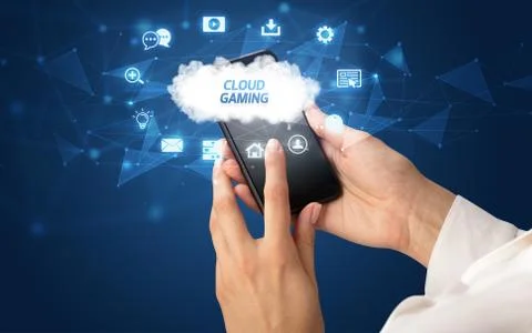 Hand using smartphone with cloud technology concept Foto stock