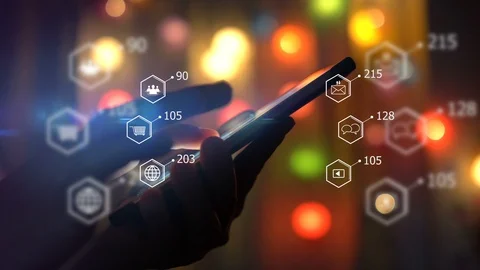 Hand using smartphone with social media icons Stock Footage 115247016