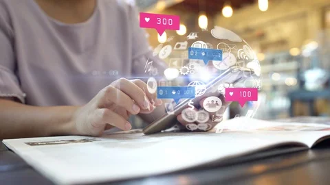 Hand using smartphone with social media icons Stock Footage 129666205