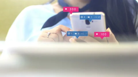 Hand using smartphone with social media icons Stock Footage 132775423