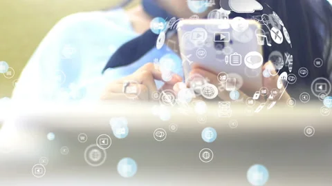Hand using smartphone with social media icons Stock Footage 138917560