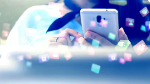 Hand using smartphone with social media icons Stock Footage 147706135