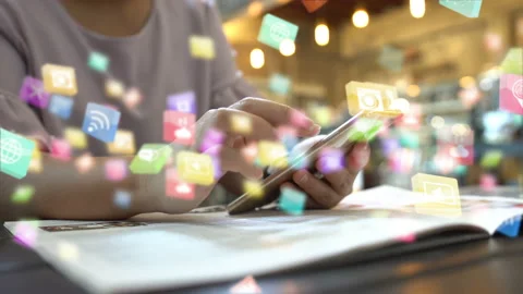 Hand using smartphone with social media icons Stock Footage 147706289