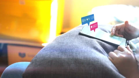 Hand using smartphone with social media icons notification Stock Footage 166594761