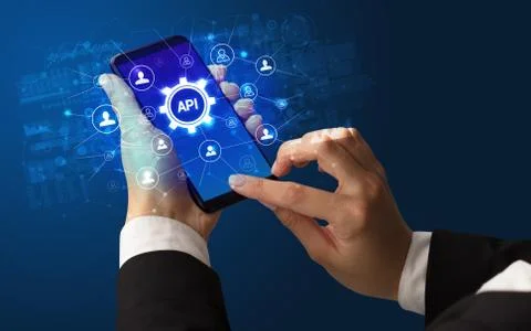Hand using smartphone with technology concept Stock Photos