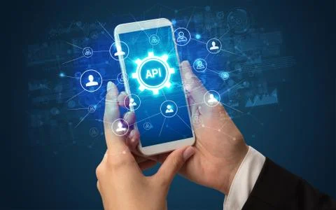 Hand using smartphone with technology concept Stock Photos