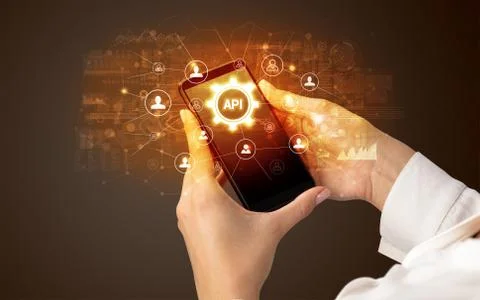 Hand using smartphone with technology concept Stock Photos