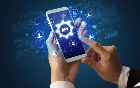 Hand using smartphone with technology concept Stock Photos