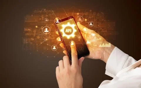 Hand using smartphone with technology concept Stock Photos
