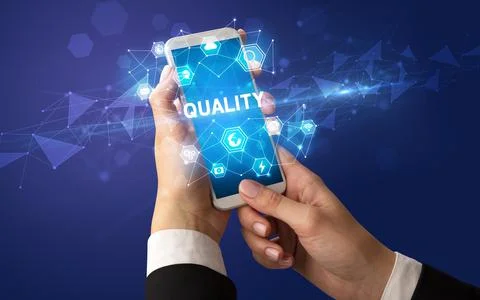 Hand using smartphone with technology concept Stock Photos