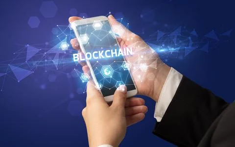 Hand using smartphone with technology concept Stock Photos