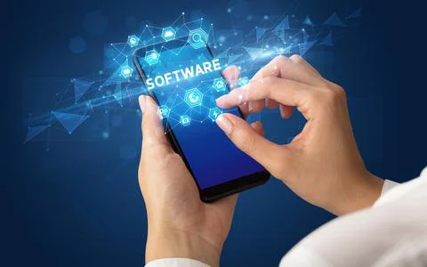 Hand using smartphone with technology concept Stock Photos