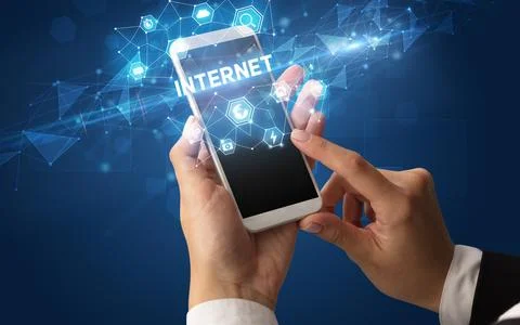 Hand using smartphone with technology concept Stock Photos