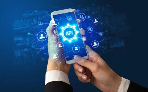 Hand using smartphone with technology concept Stock Photos