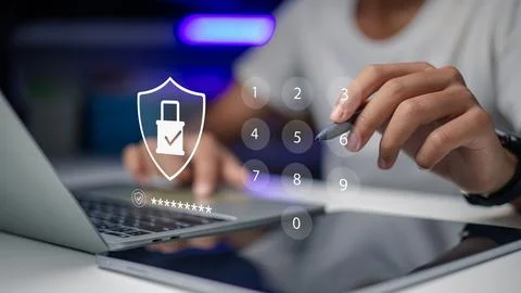 Hand using stylus pen on virtual numeric keypad for cybersecurity login on .. 写真素材
