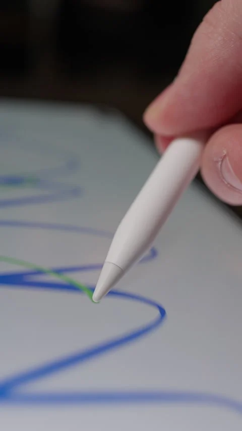 Hand Using Stylus To Scribble On Electronic Tablet Video stock 308580048