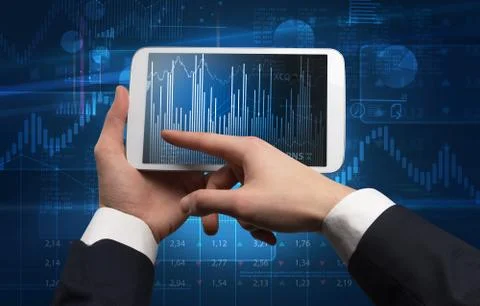 Hand using tablet and checking financial report concept 스톡 사진