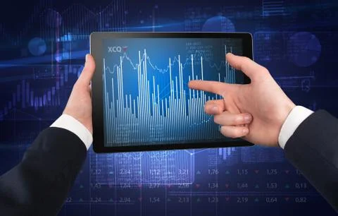 Hand using tablet and checking financial report concept Foto stock