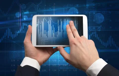 Hand using tablet and checking financial report concept Foto stock