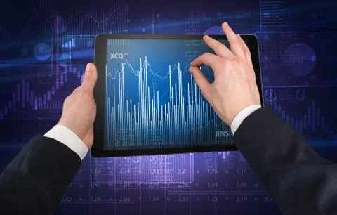 Hand using tablet and checking financial report concept Foto stock