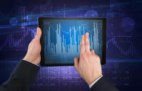 Hand using tablet and checking financial report concept Stock Photos