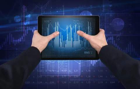 Hand using tablet and checking financial report concept Stock Photos
