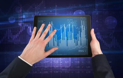 Hand using tablet and checking financial report concept 스톡 사진
