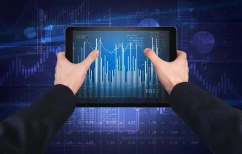 Hand using tablet and checking financial report concept Stock Photos