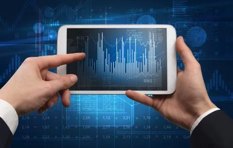 Hand using tablet and checking financial report concept 写真素材