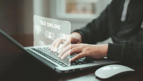 Hand using tablet with bar  TAX REFUND and refund tax of duty taxation busine Stock Photos
